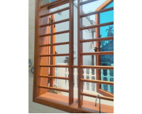 Tham khảo một số mẫu cửa nhôm kính khung gỗ đẹp nhất 2024 